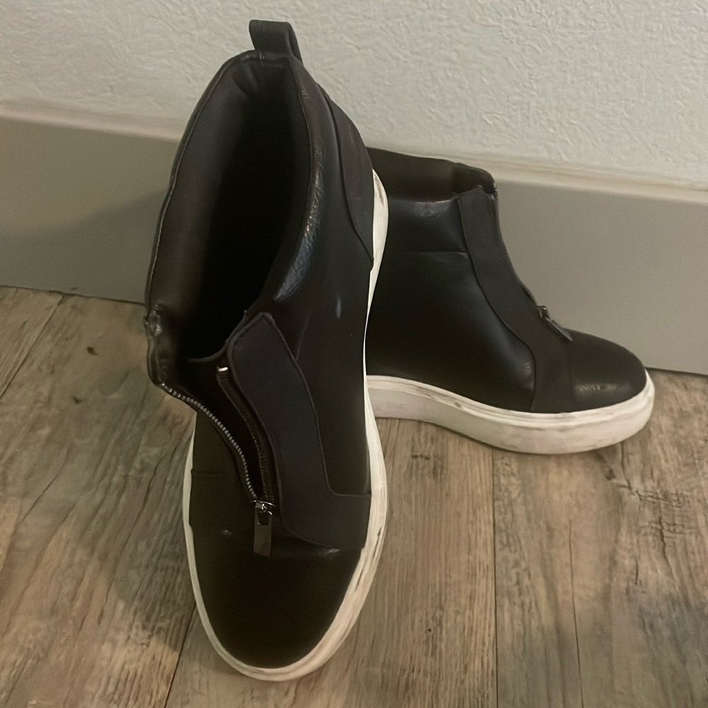 Black leather wedge lifestyle shoes